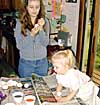 Nickki and Kaylie decorating eggs