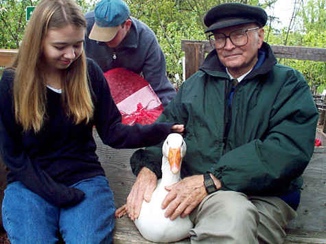 Dad with a goose in his lap